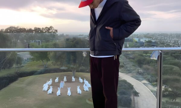 Boy with red cap and red shoes